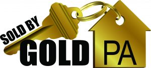 Kristen Gold logo house with key, black and gold on white. 